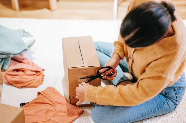 Woman packing a box